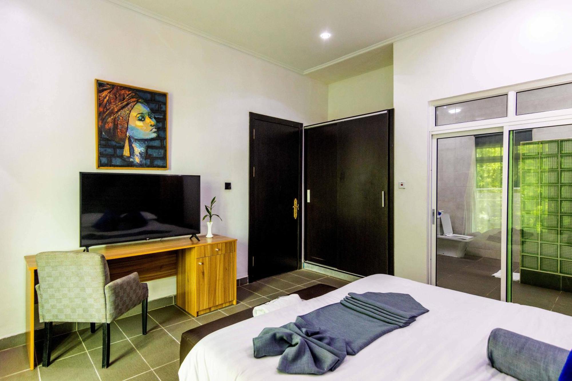 Nelson Mandela Gardens Hotel Okpanam Exterior photo